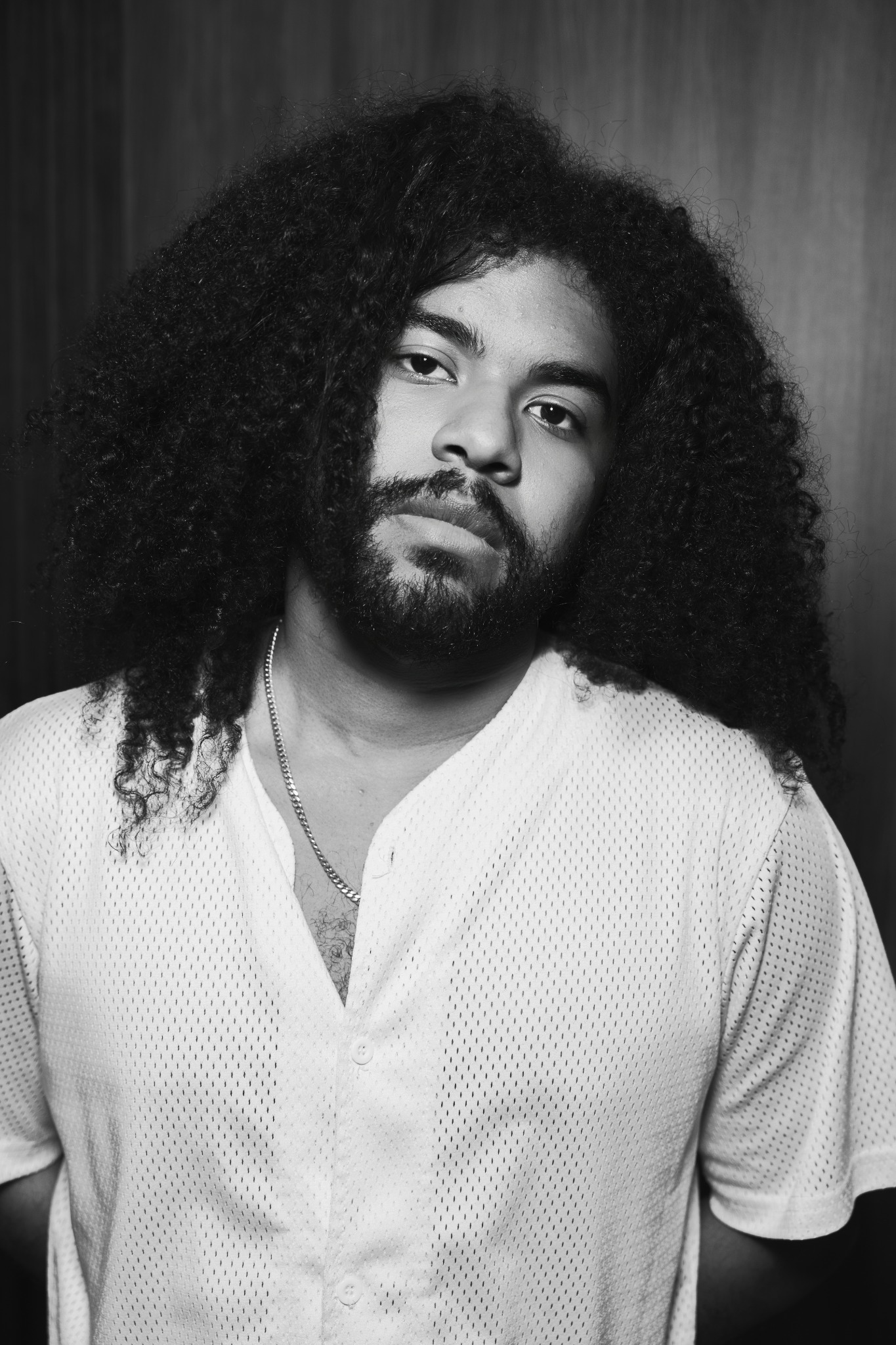 Black-and-white portrait of Diego Echevers, fashion photographer known as DETHO